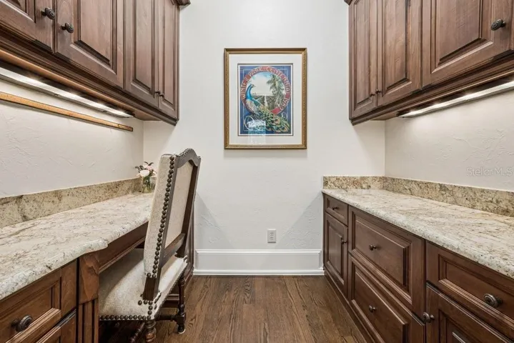 Work station and small office off the kitchen area.