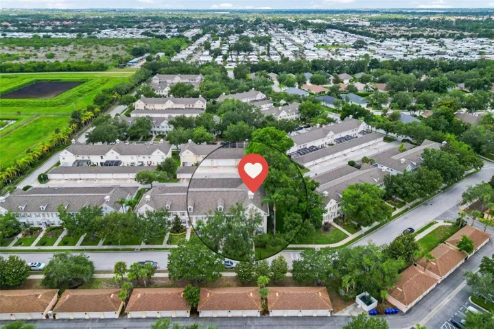 Aerial view showing the oversized lot beside.