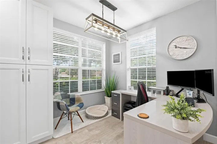 Eating area in kitchen is being used as a home office.