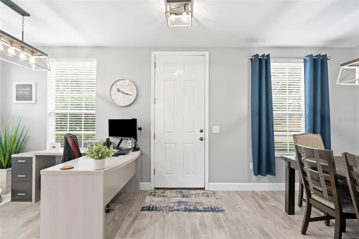 Front entry, home office area, dining room.