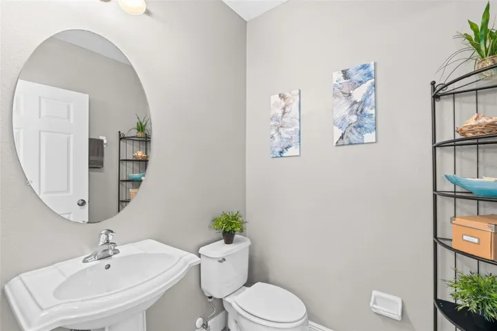 Powder room off great room.