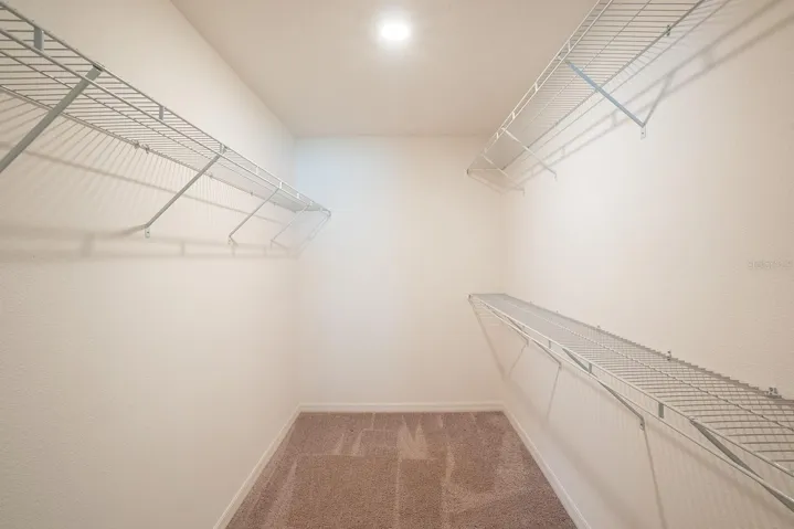 Primary walk-in closet