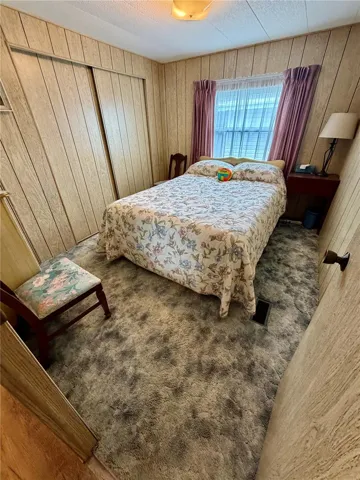 Guest bedroom with a wall to wall closet.