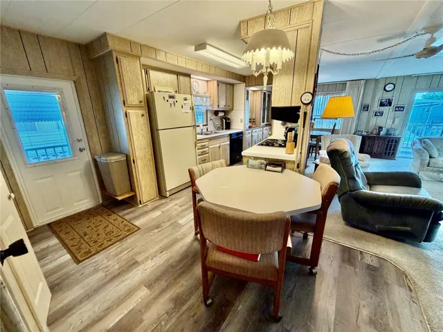 Newer entry door, breakfast area, open to the living space.