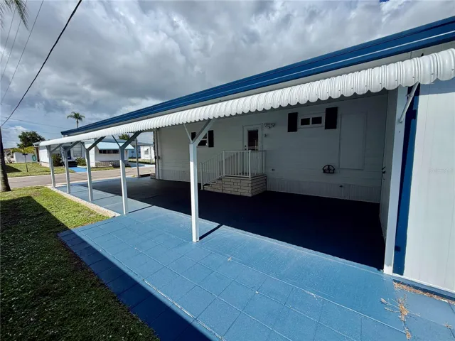 Featuring carport extensions for a wider driveway and some extra living space great for sunning!