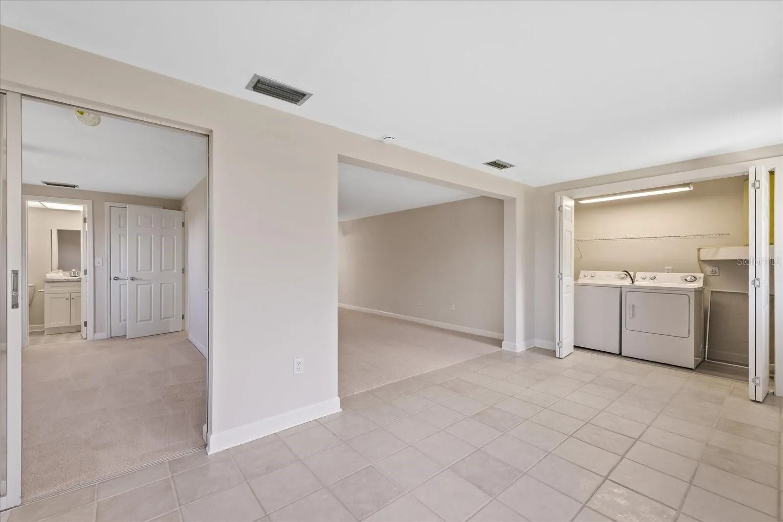 Indoor laundry closet with washer/dryer included