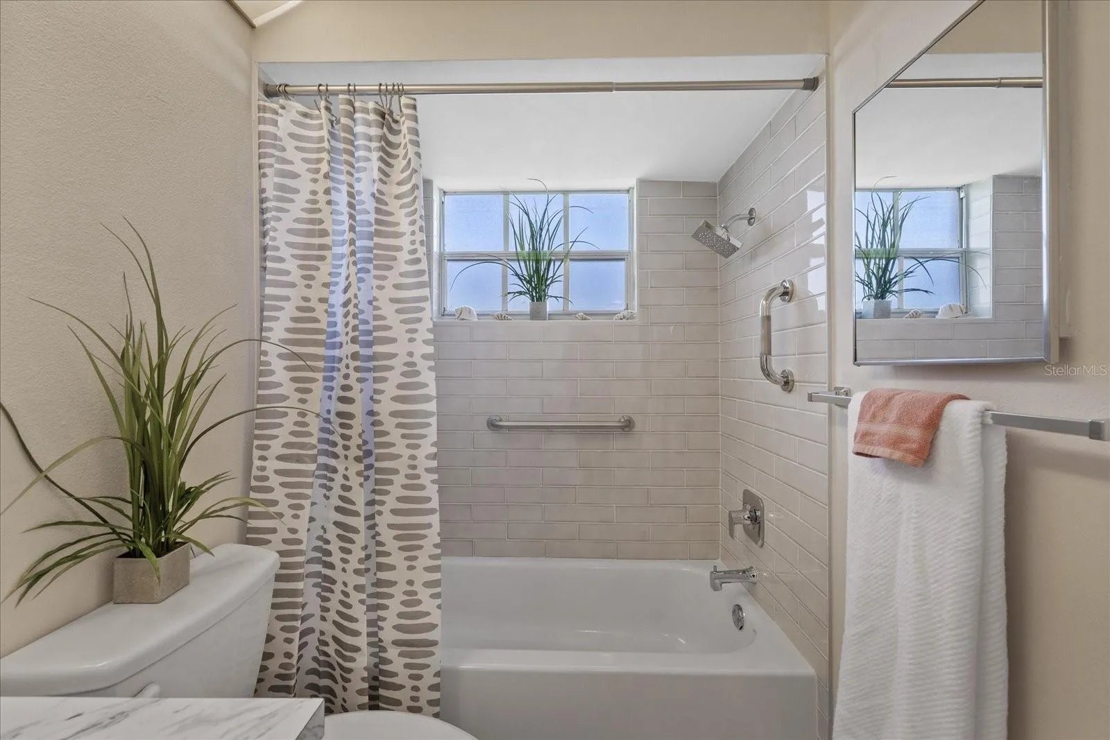Guest bathroom off hallway near guest bedroom