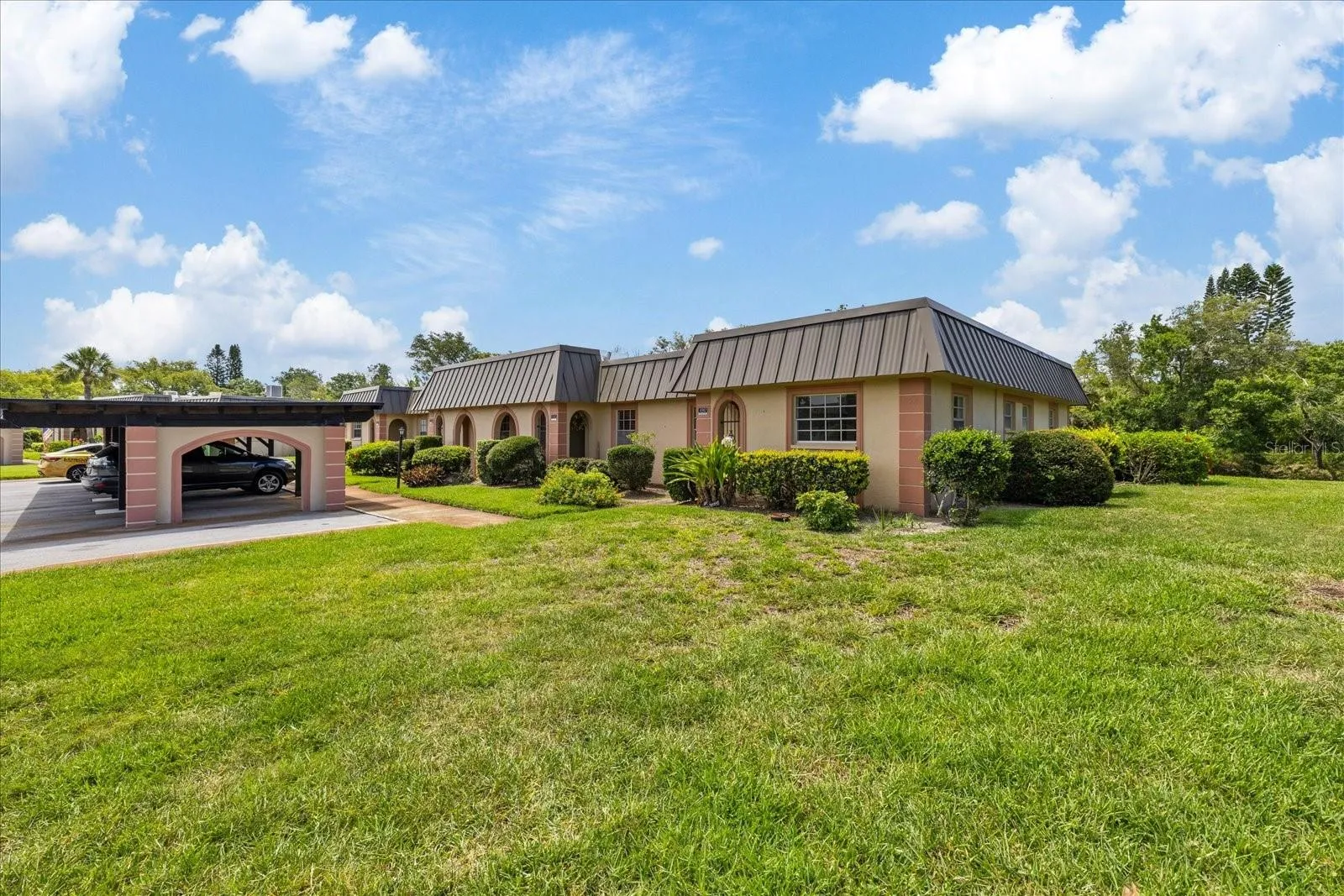 Front yard and side view of unit