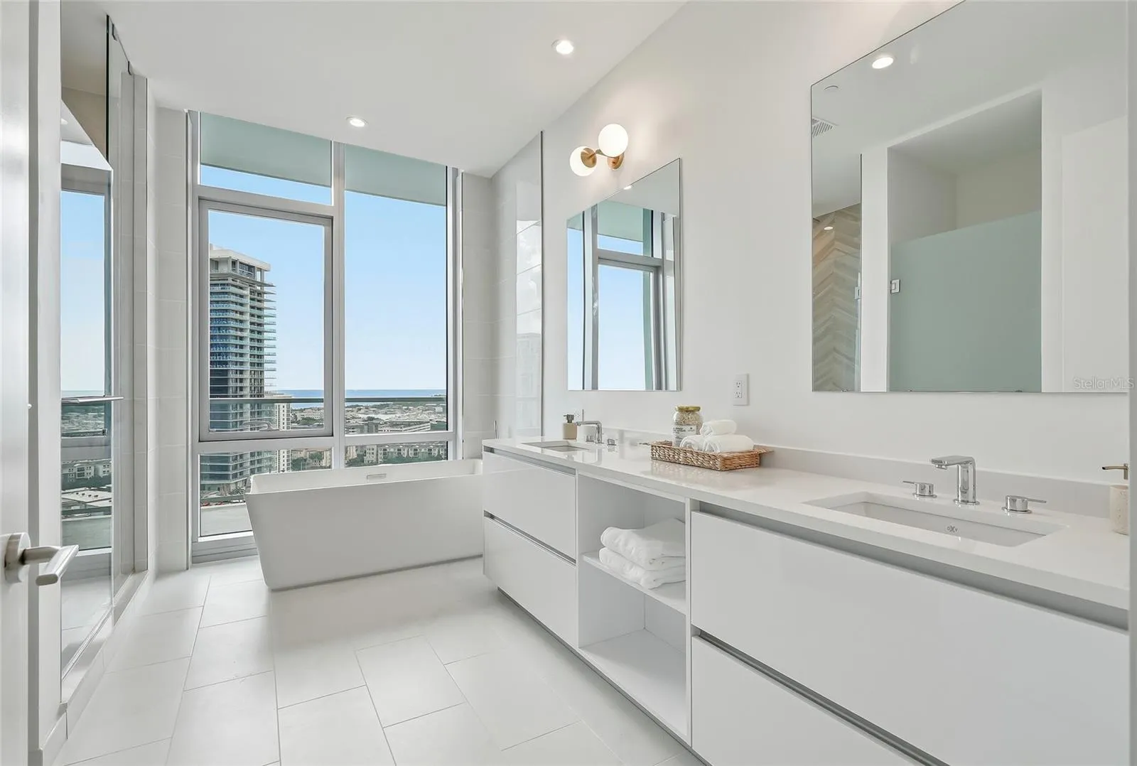 Freestanding soaking tub and shower create a luxurious escape.