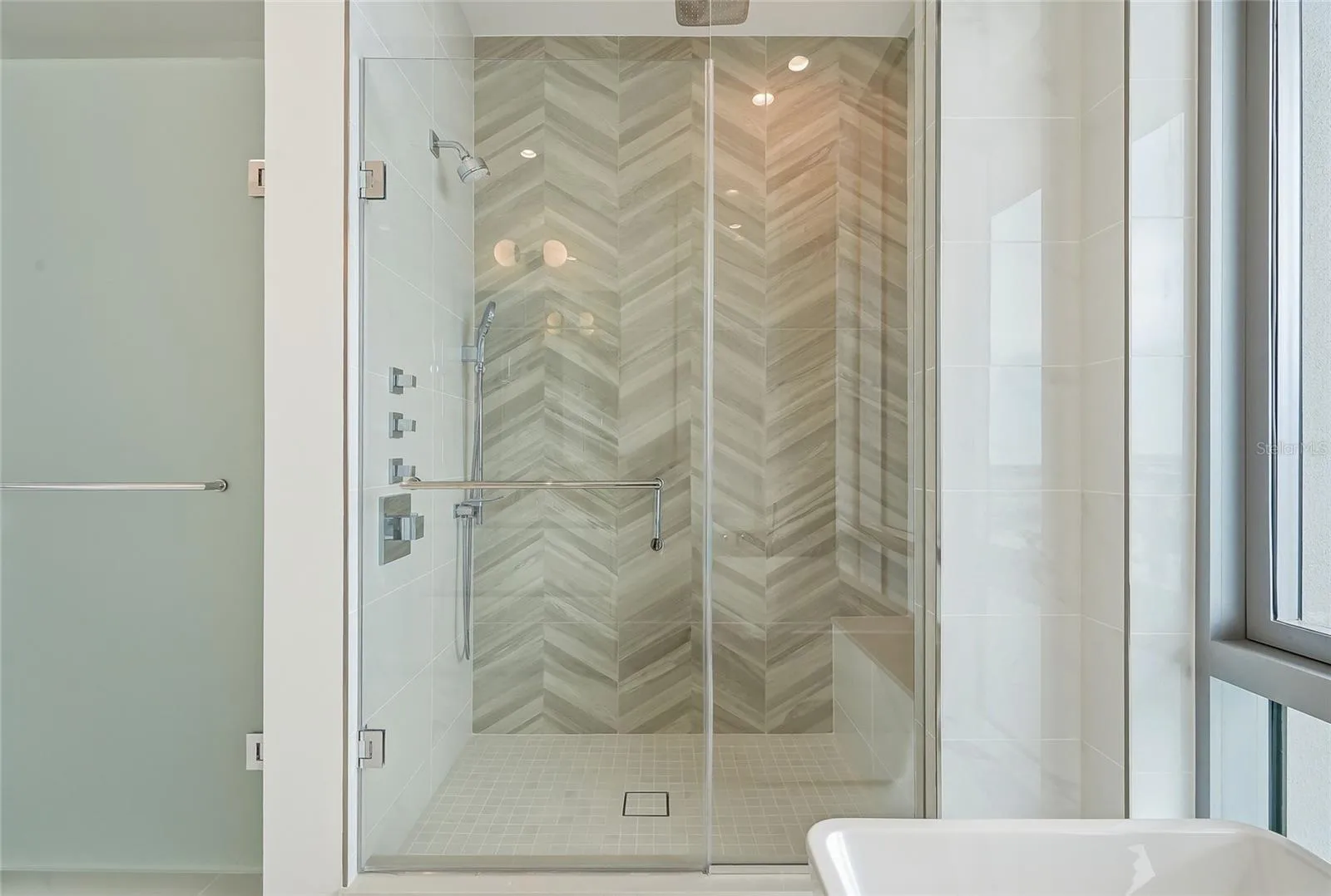 Primary bathroom walk-in shower.