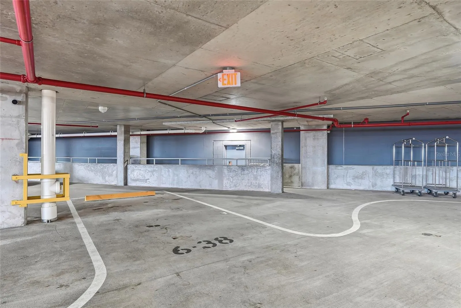 Prime parking space located directly next to the door, with no parking space beside you. Plus 1 valet parking space.