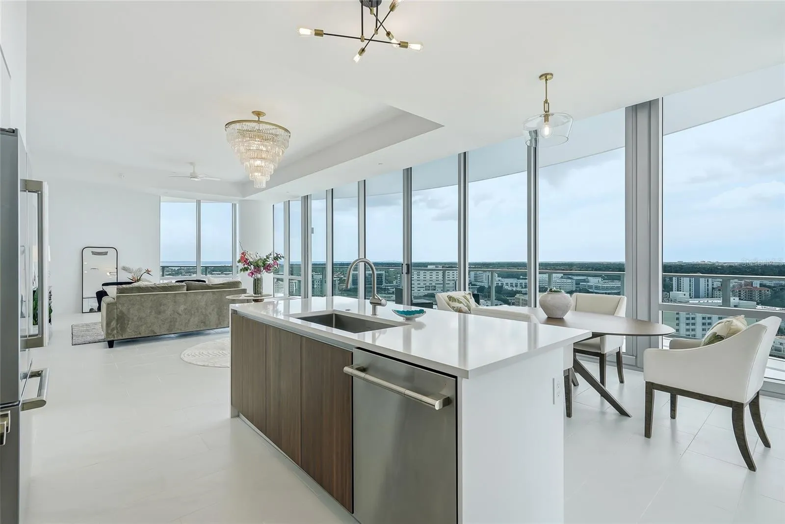 Floor-to-ceiling windows frame expansive views and fill the residence with natural light.