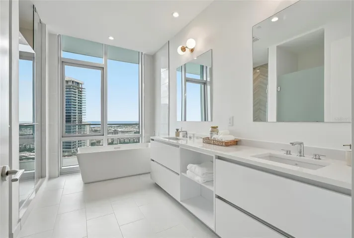 Freestanding soaking tub and shower create a luxurious escape.