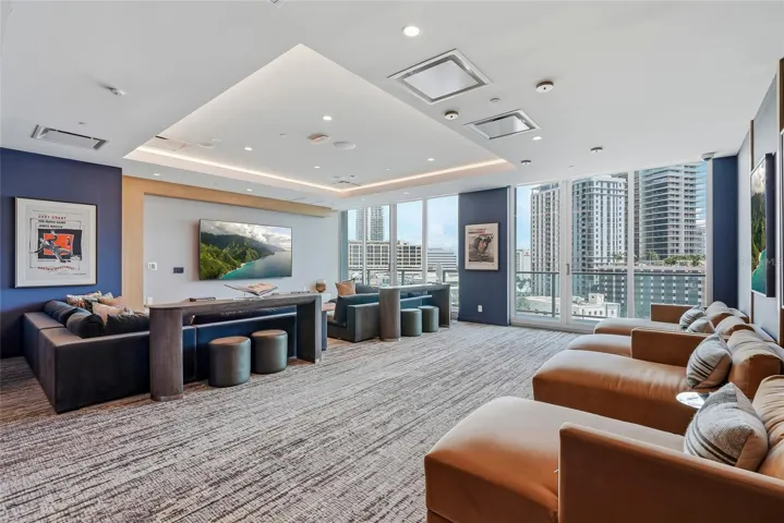 Enjoy movie nights and entertain guests in the private theater room.