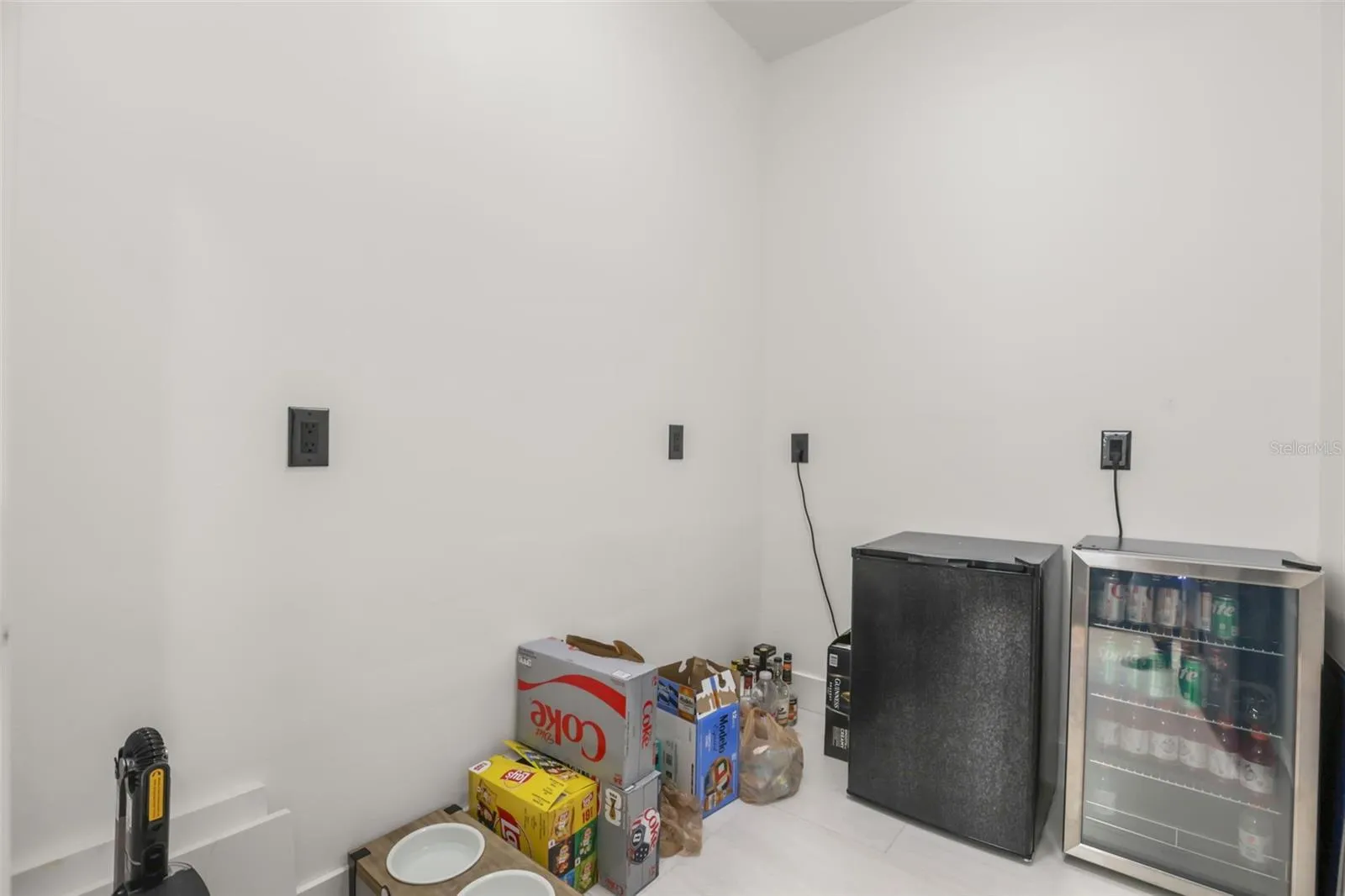 This flexible utility space includes room for beverage refrigeration, extra storage, or household organization.