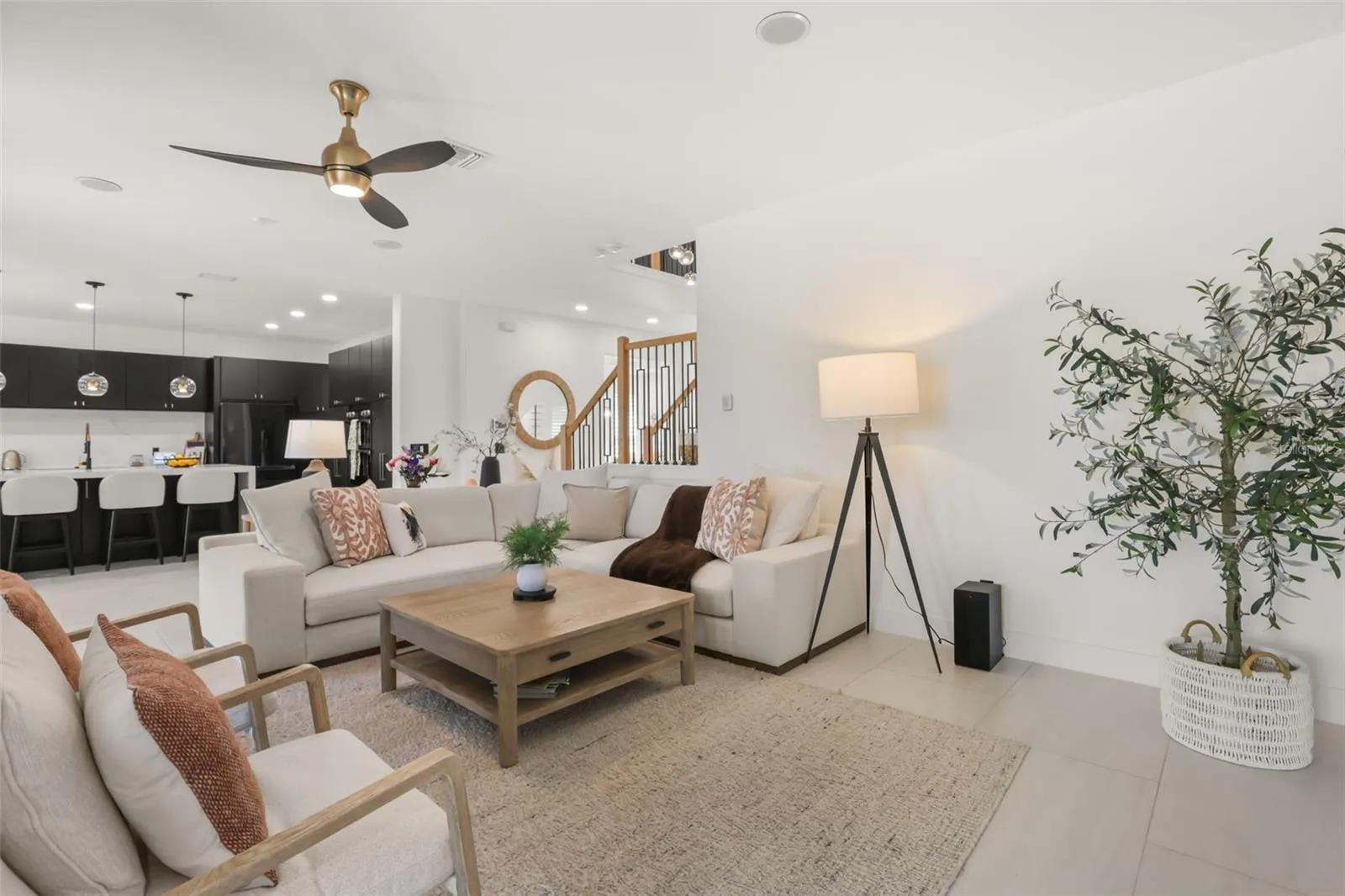This inviting family room opens directly to the kitchen, offering seamless flow for entertaining and daily living.