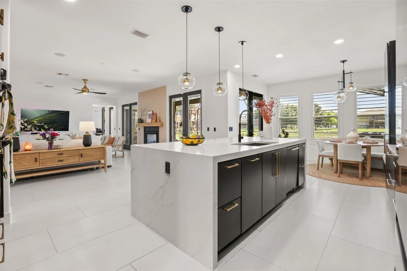 The kitchen opens to the family room and breakfast area, creating an easy flow for casual living and entertaining.