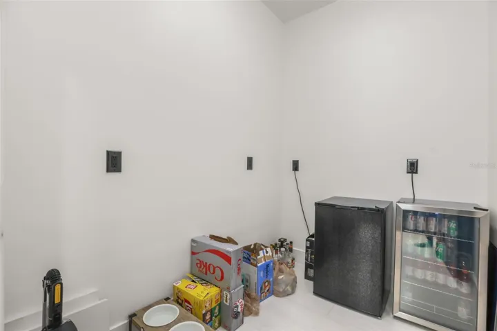 This flexible utility space includes room for beverage refrigeration, extra storage, or household organization.