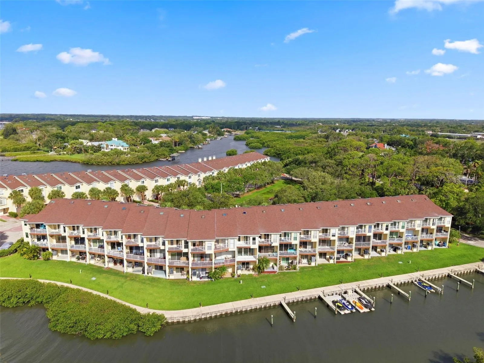 Gated community, condo with water views and deeded private dock