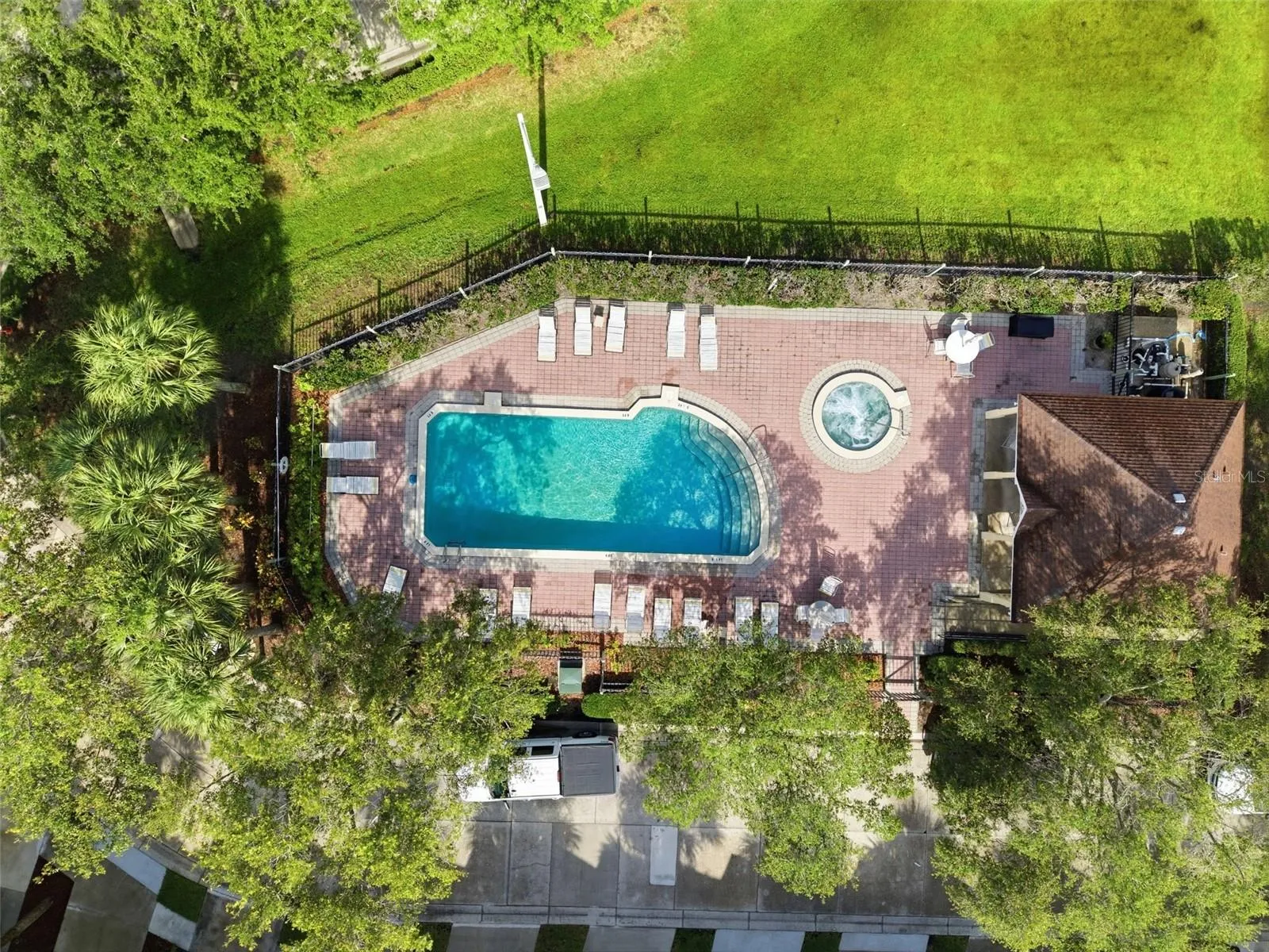 Amenities include, tennis courts, private slips, pool in this quiet gated community on the water