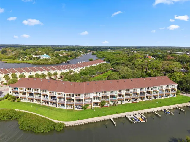 Gated community, condo with water views and deeded private dock