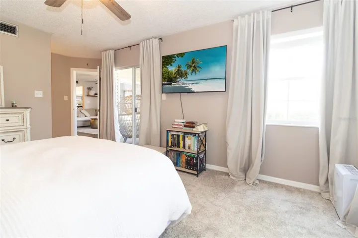 Enter your patio through sliding glass doors from your master suite
