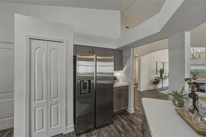 Kitchen with Brand New Sleek Handleless Design Refrigerator