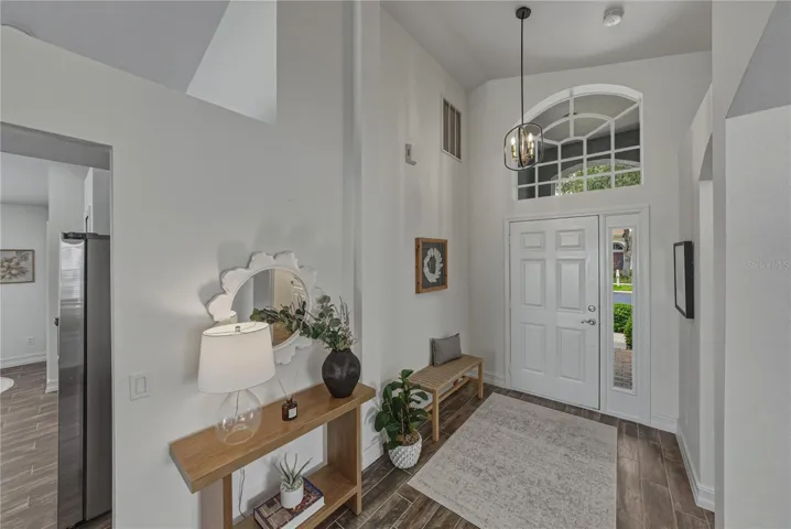 Lovely Foyer with Vaulted Ceilings