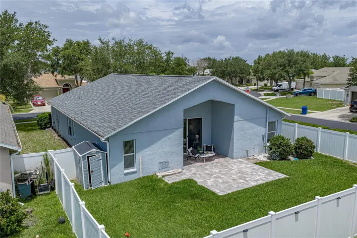 Rear Fenced Yard with recent Vinyl Fence