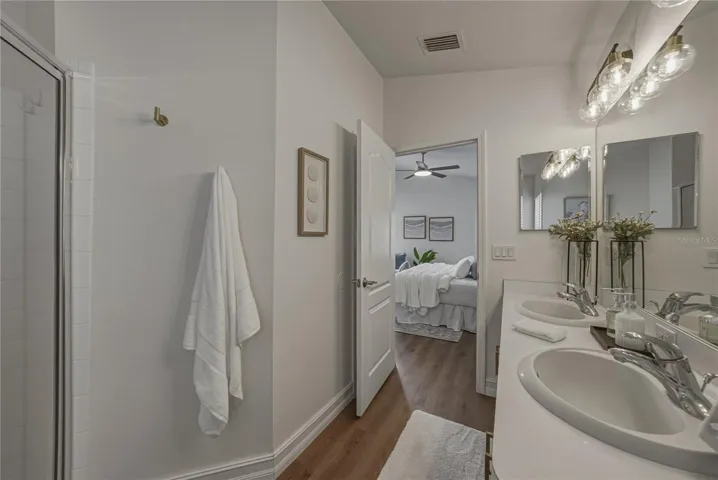 Primary Bath with Linen Closet behind the door