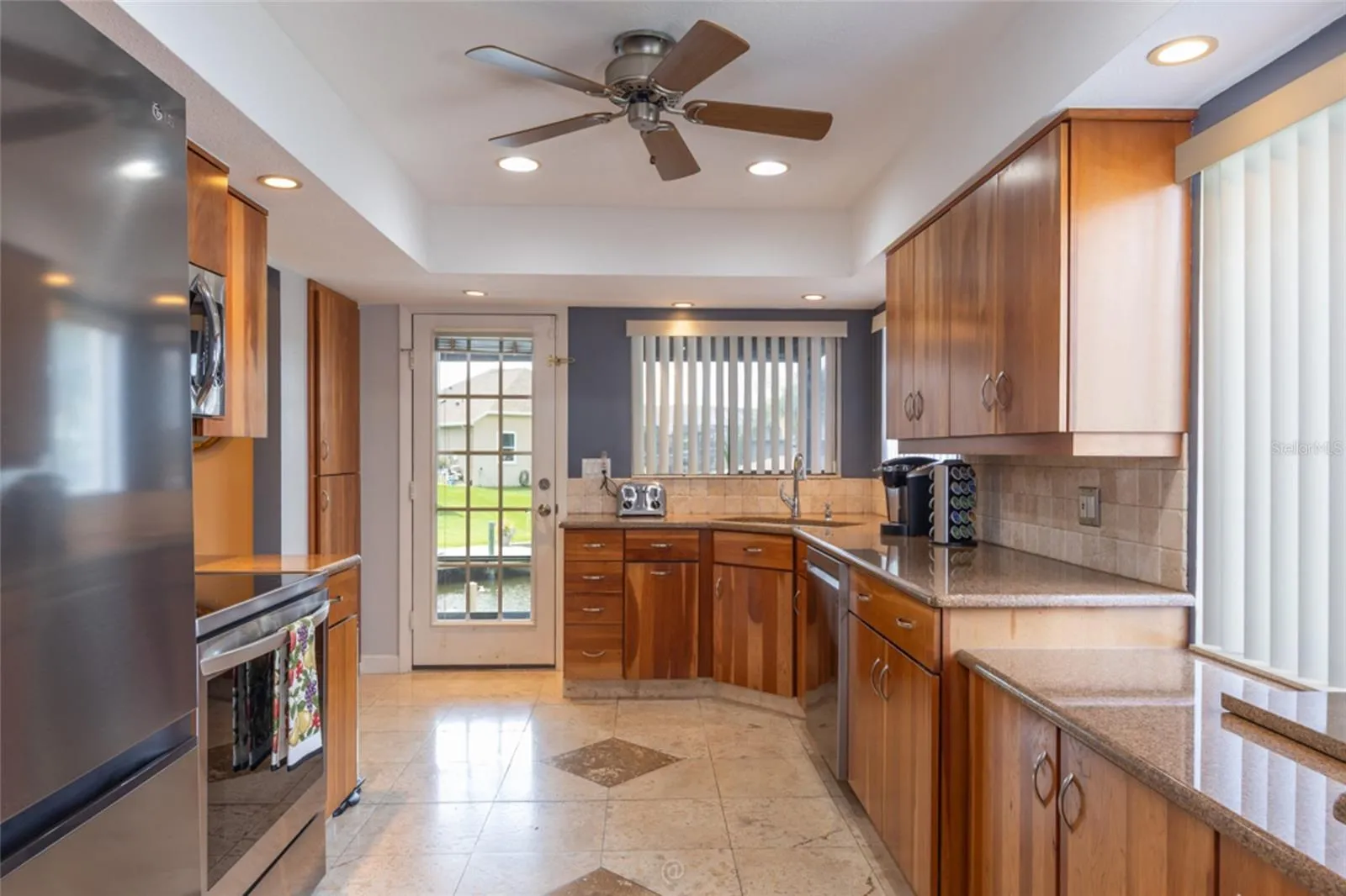 Remodeled Kitchen With Granite Counter Tops