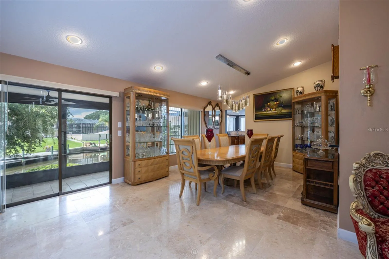 Formal Dining Room With Polished Sealed Travertine Floors