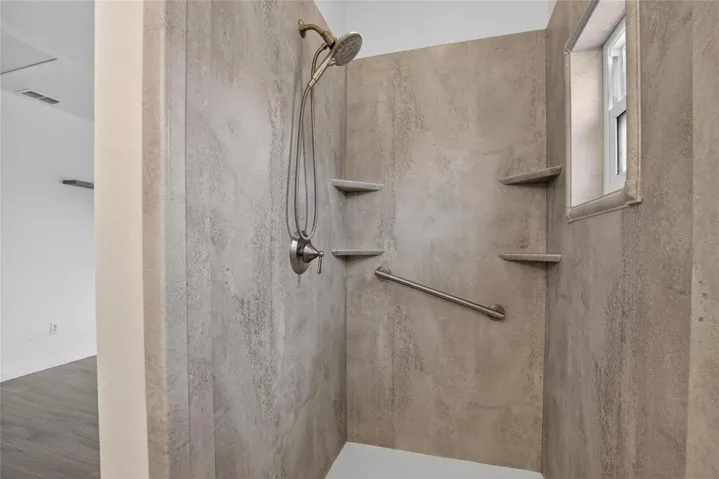 Primary bathroom shower.