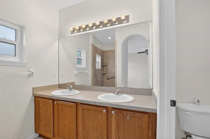 Primary bathroom with dual sinks.