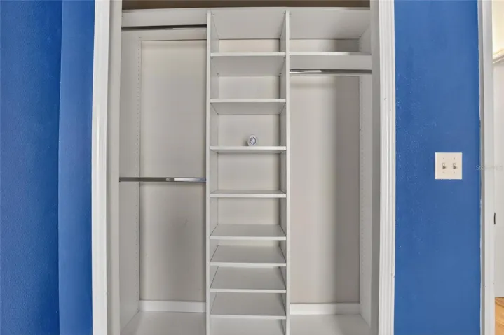 Bedroom 2 closet with built ins.