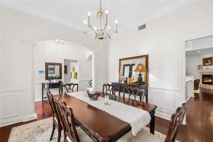 Crown molding detail and light fixtures wisper elegance.