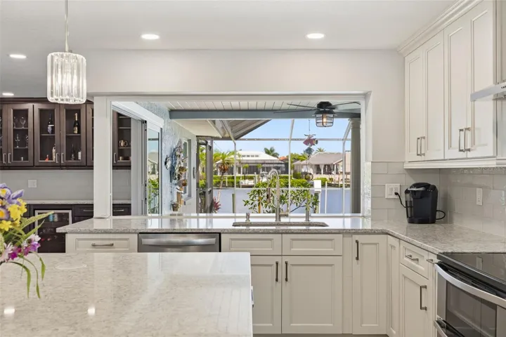 The Service Double Pane Window also pockets for ease to serve the Pool area! Dishes don't appear to be a chore!