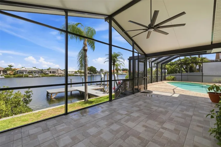 Screen Room with Insulated Vaulted Ceiling,  6' Ceiling Fan and Tile Floor!