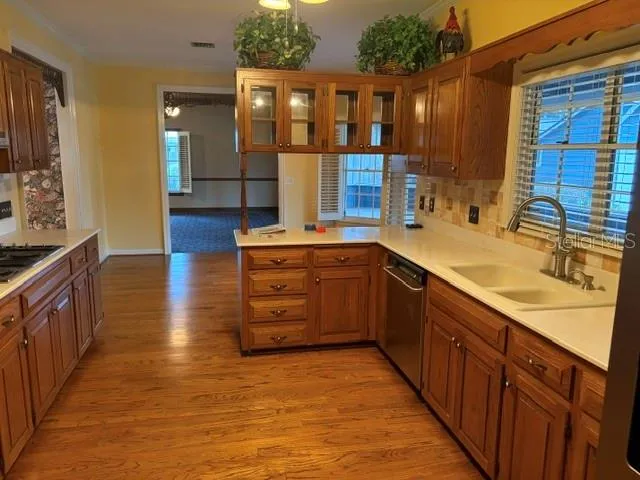 Kitchen w/eat in space & window overlooking the patio & pool