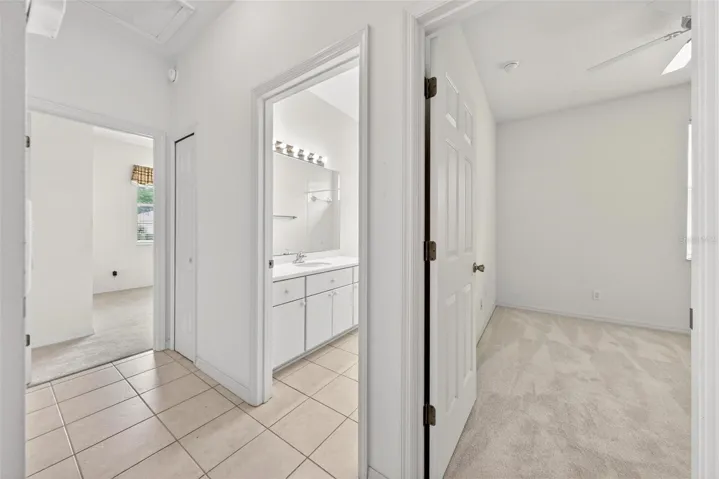 Hallway to secondary bedrooms and bathroom