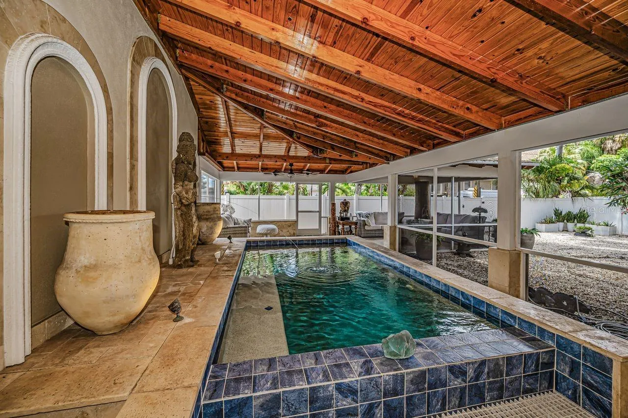 Custom crafted, rafters formed from a solid single Redwood tree, which will stand up effortlessly to Florida’s heavy humidity, salt-air breezes, and year-round heat.