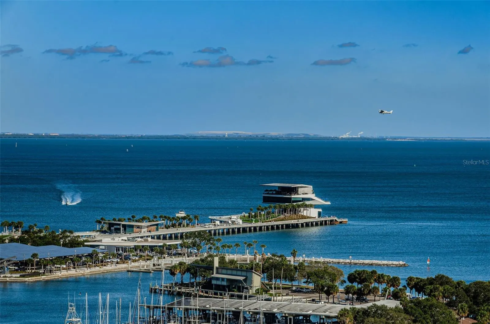 The Iconic St. Pete Pier, with planes flying over and boats running about. There is so much to do in St. Pete!
