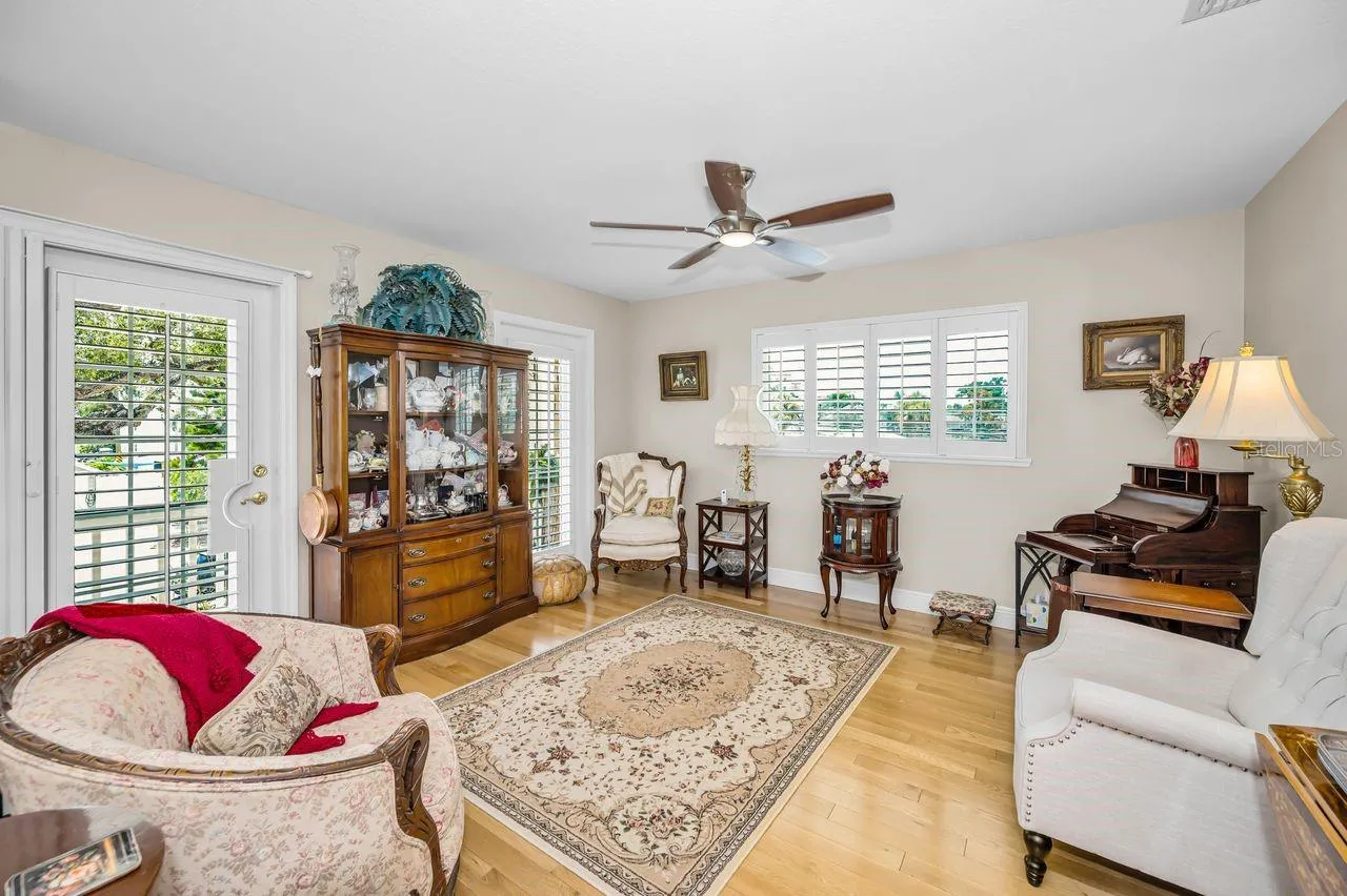 Living room with balcony access.