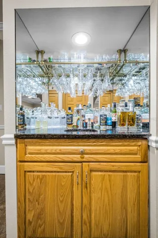 Separate wet bar directly off the kitchen.
