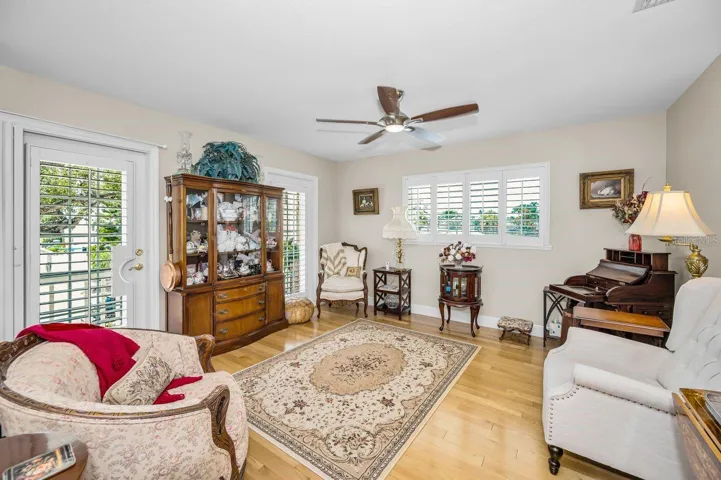 Living room with balcony access.