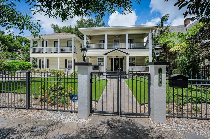 Wrought Iron fence surrounding the front lawn.