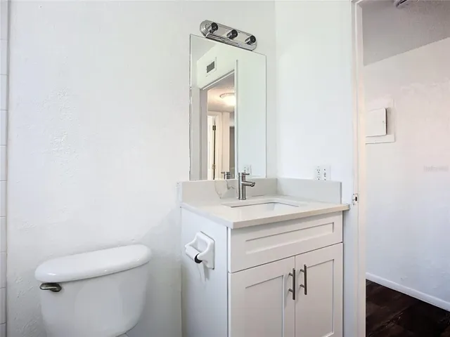 Ensuite bathroom with another entry door from the hallway for guests.