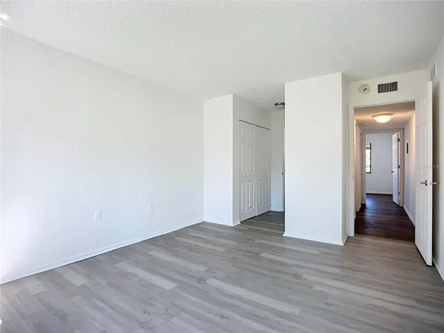 Another view of the primary bedroom.