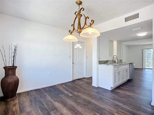 Dining room and kitchen.