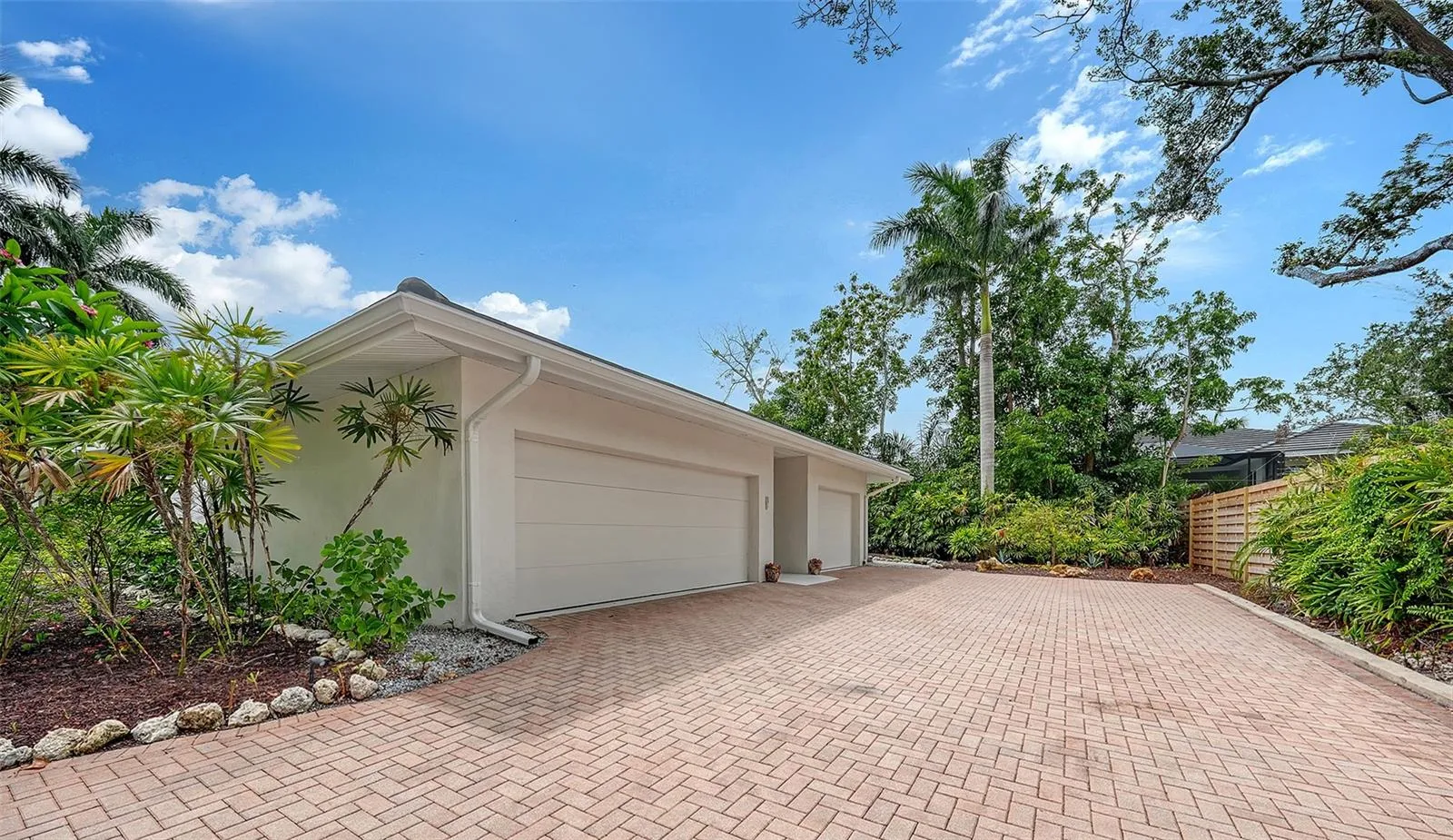 2 car garage plus 1 car garage with 1 air-conditioned bay